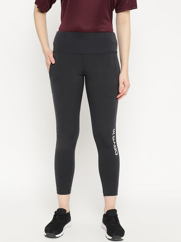 Minimal Athleisurewear: Black Leggings and White Crop Sweatshirt