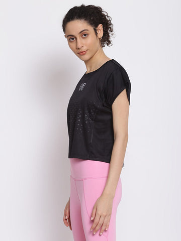 woman with DRYP athleisure tanktop and tights