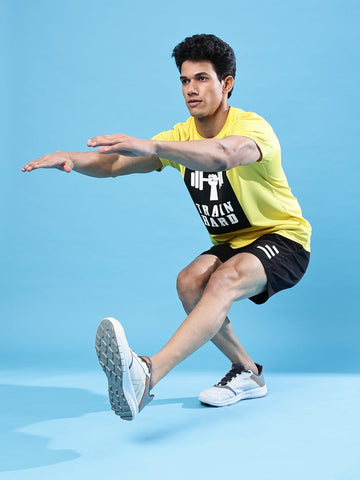 man doing squat exercise